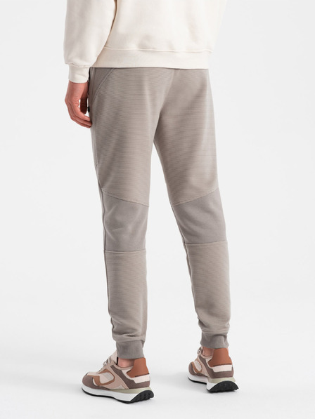 Ombre Clothing Svetlošedé pánske tepláky Ombre Clothing