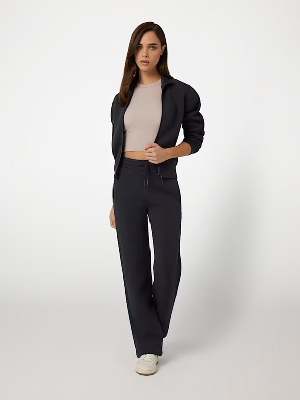 Guess Jeans Dámske tmavo modré tepláky s bočným logom Guess jeans